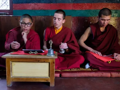 A Trio of Students Chanting