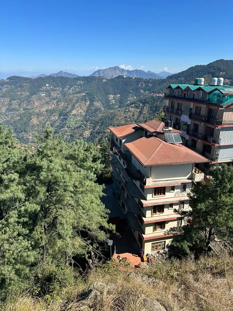 Monastic buildings set in the Himalayan landscape